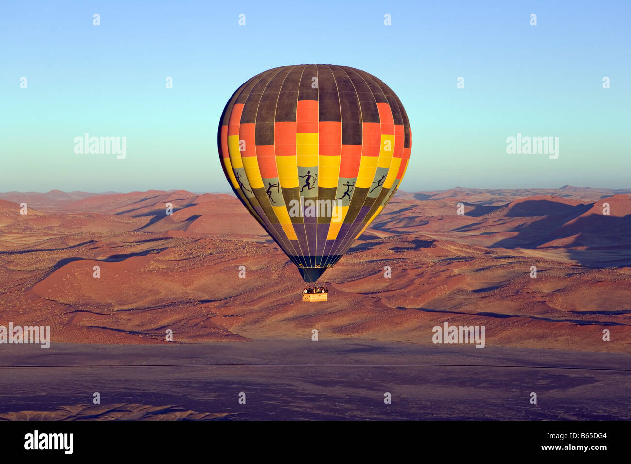 Hot air ballooning over Namib Desert dunes Naukluft NP Namibia Stock Photo