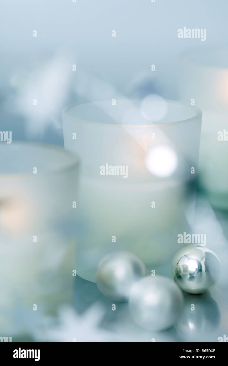 Christmas ornaments and candles, close-up Stock Photo