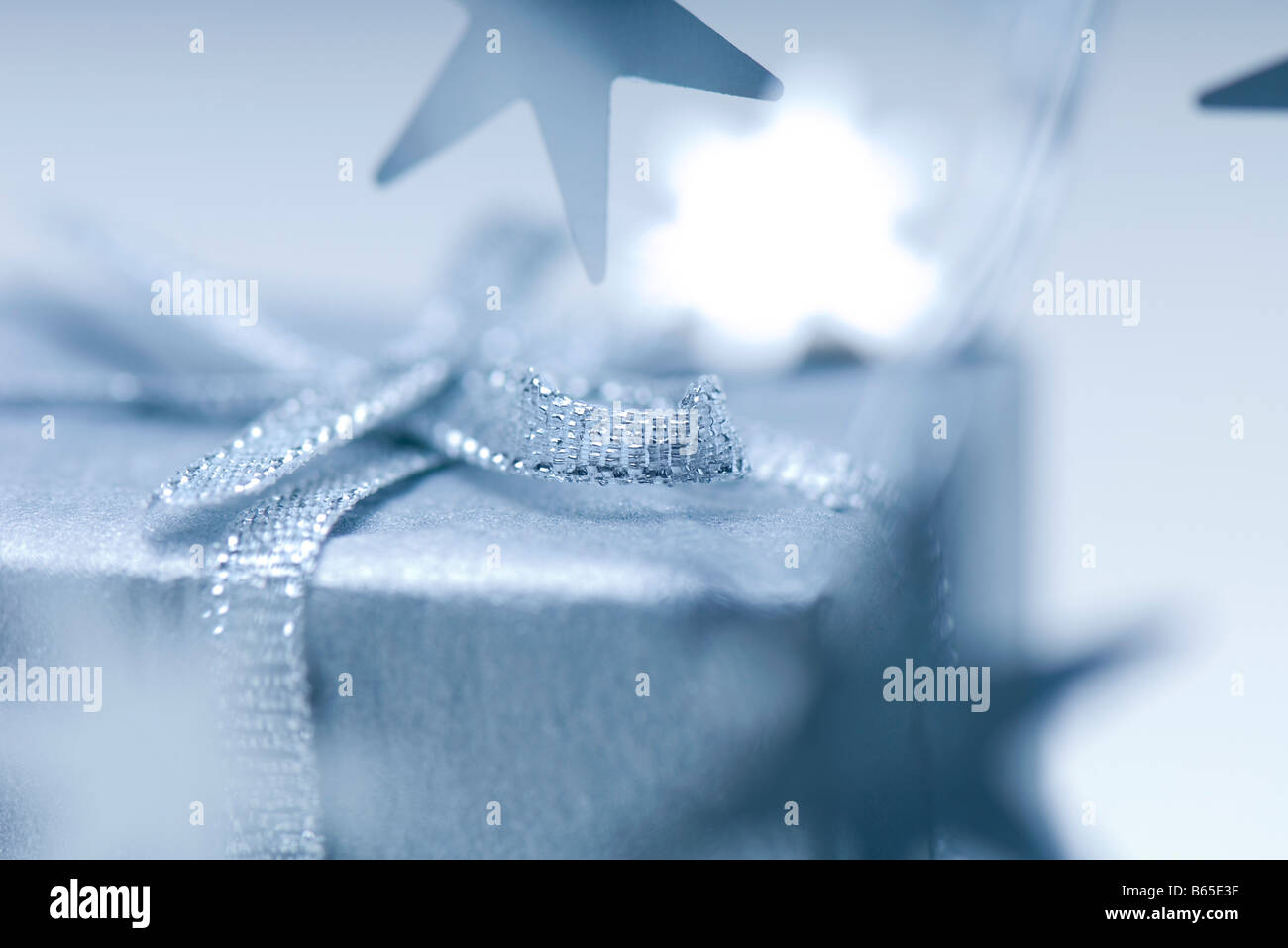 Christmas gift and star shaped ornaments, selective focus Stock Photo