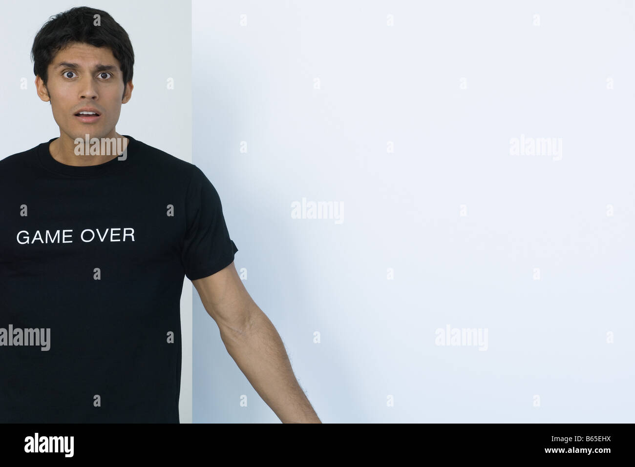 Man wearing tee-shirt printed with the words "game over" Stock Photo