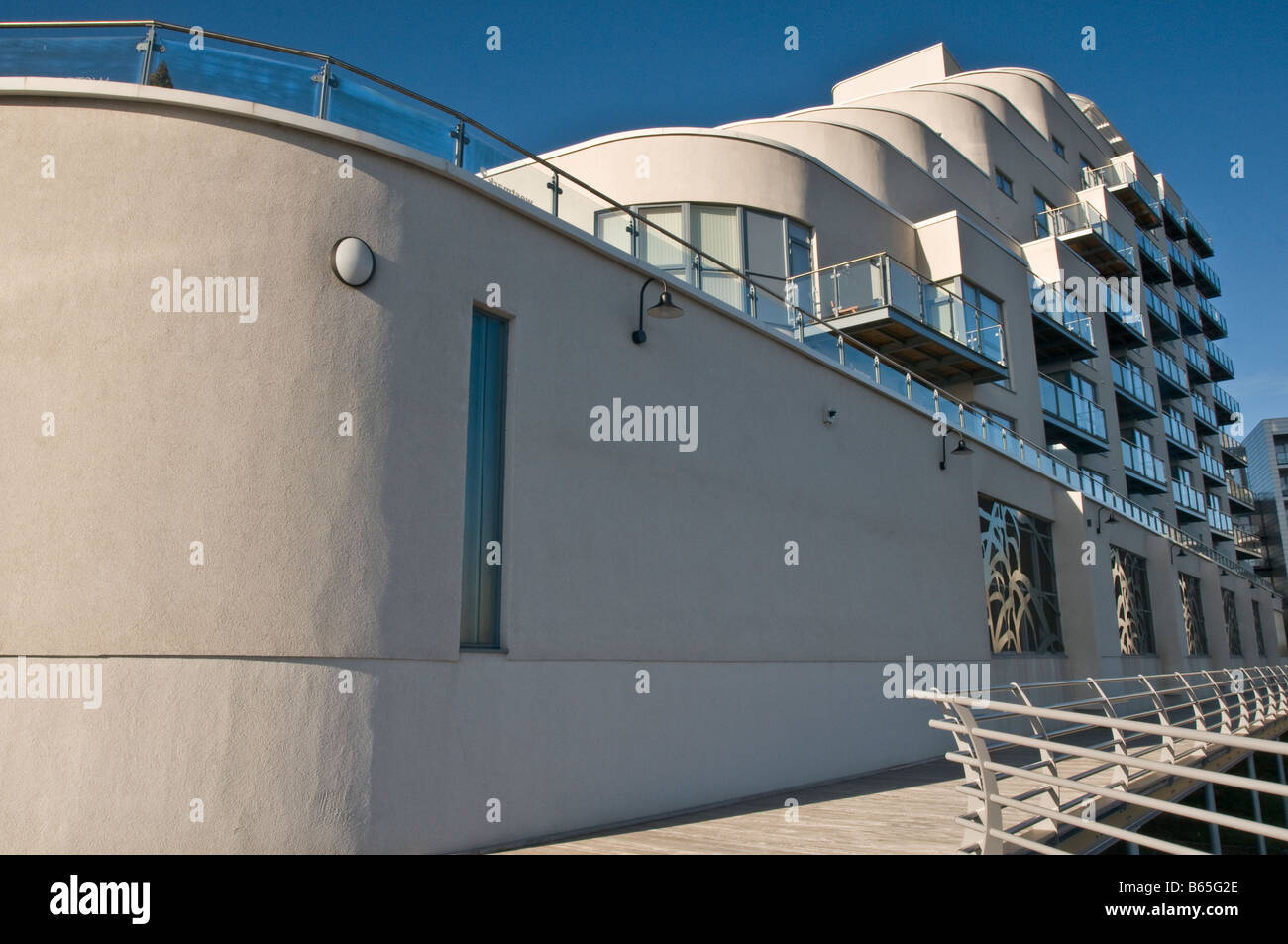 A close up shot of a modern apartment block in Cardiff Bay designed like a ship Stock Photo