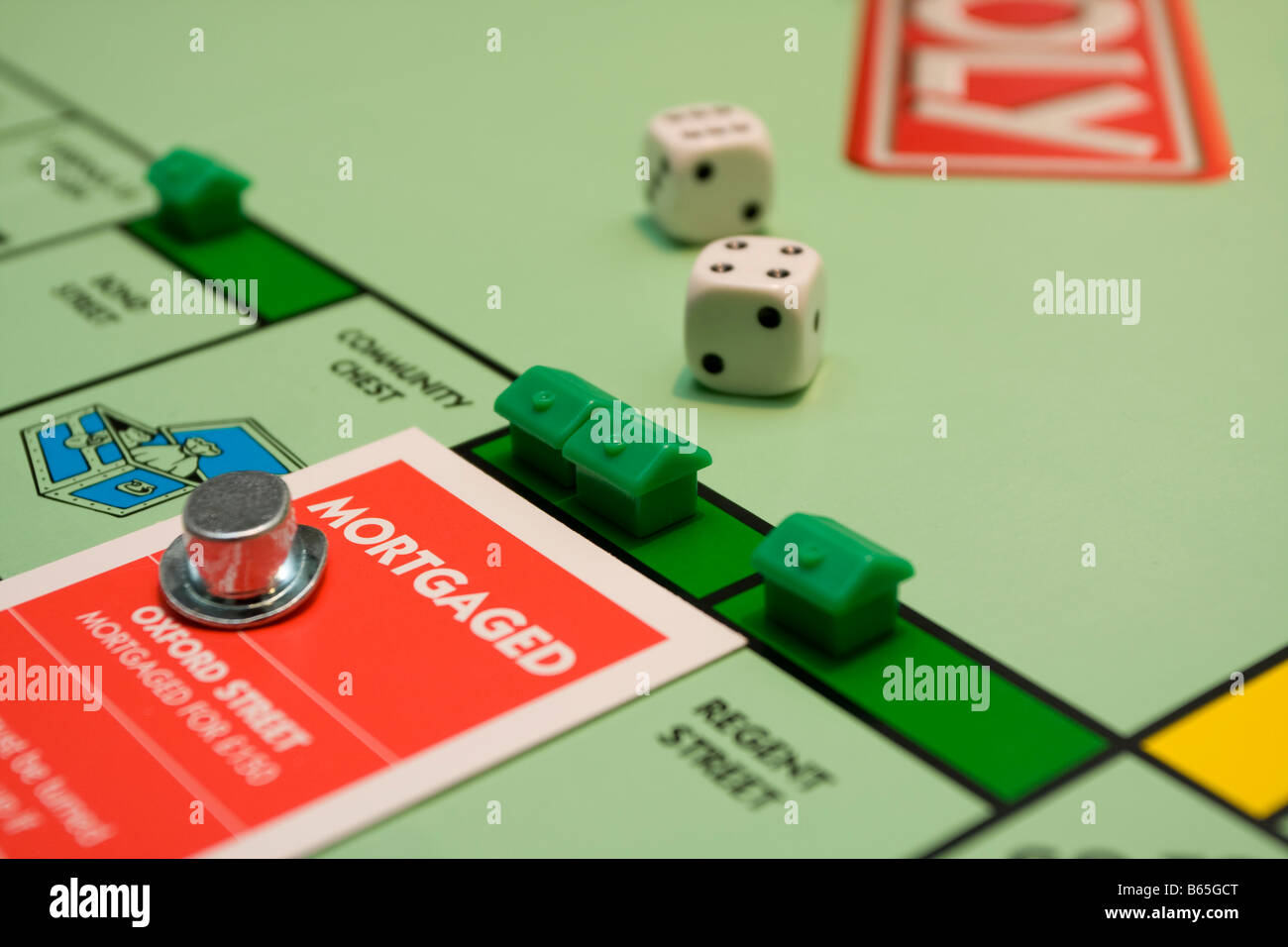 mortgaged monopoly houses Stock Photo Alamy