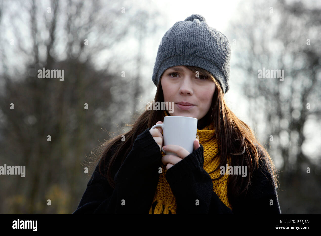 Young Girl drinking Tea Stock Photo Alamy