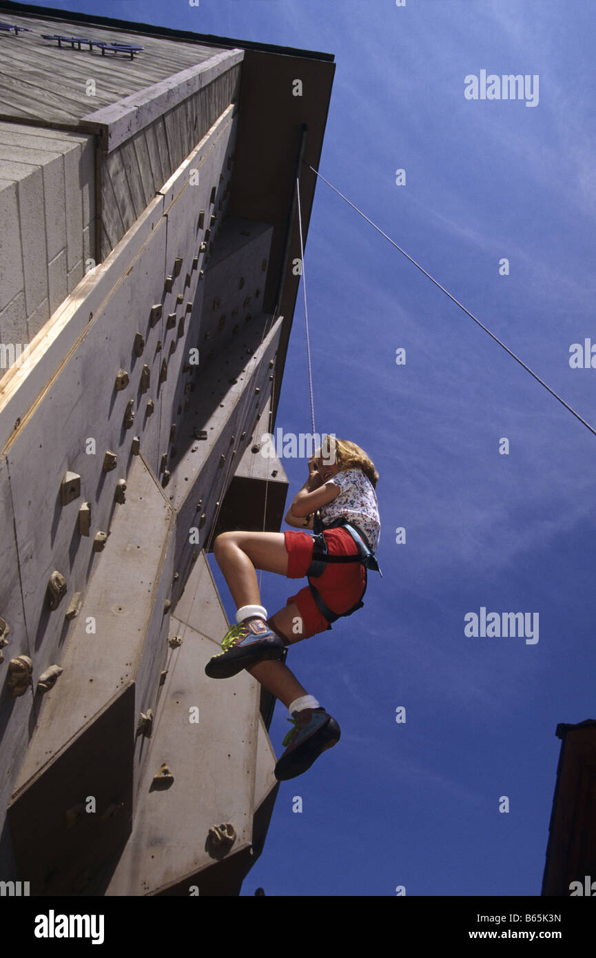 Girl outdoor wall climbing model release Stock Photo