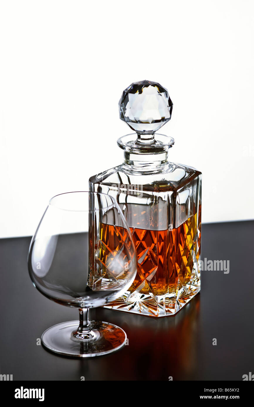 Brandy in crystal decanter with brandy glass Stock Photo Alamy