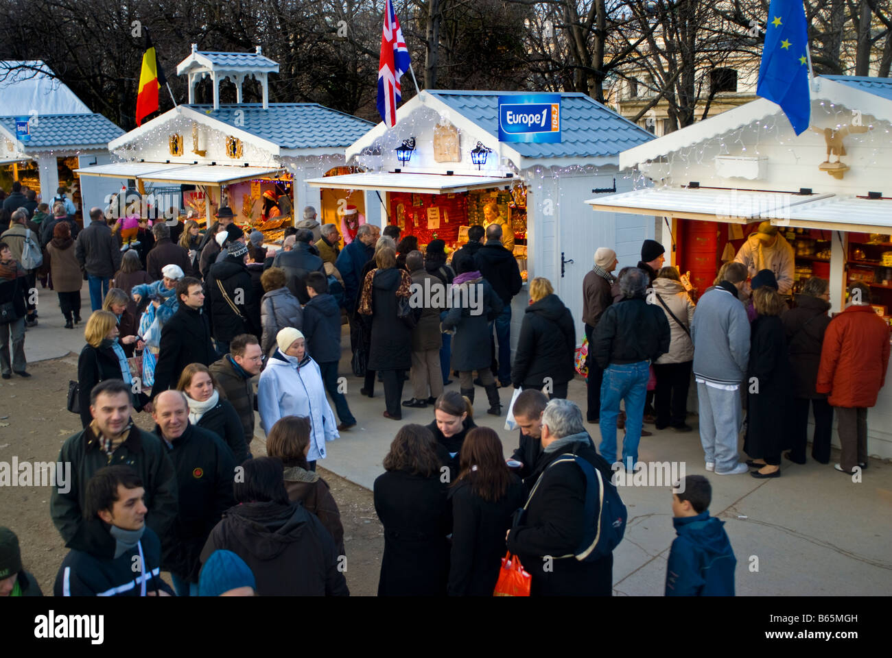 Paris France, Christmas Shopping Crowds at Traditional Holiday Market, Street Vendors, stalls on 'Avenue des Champs  Elysees' Stock Photo