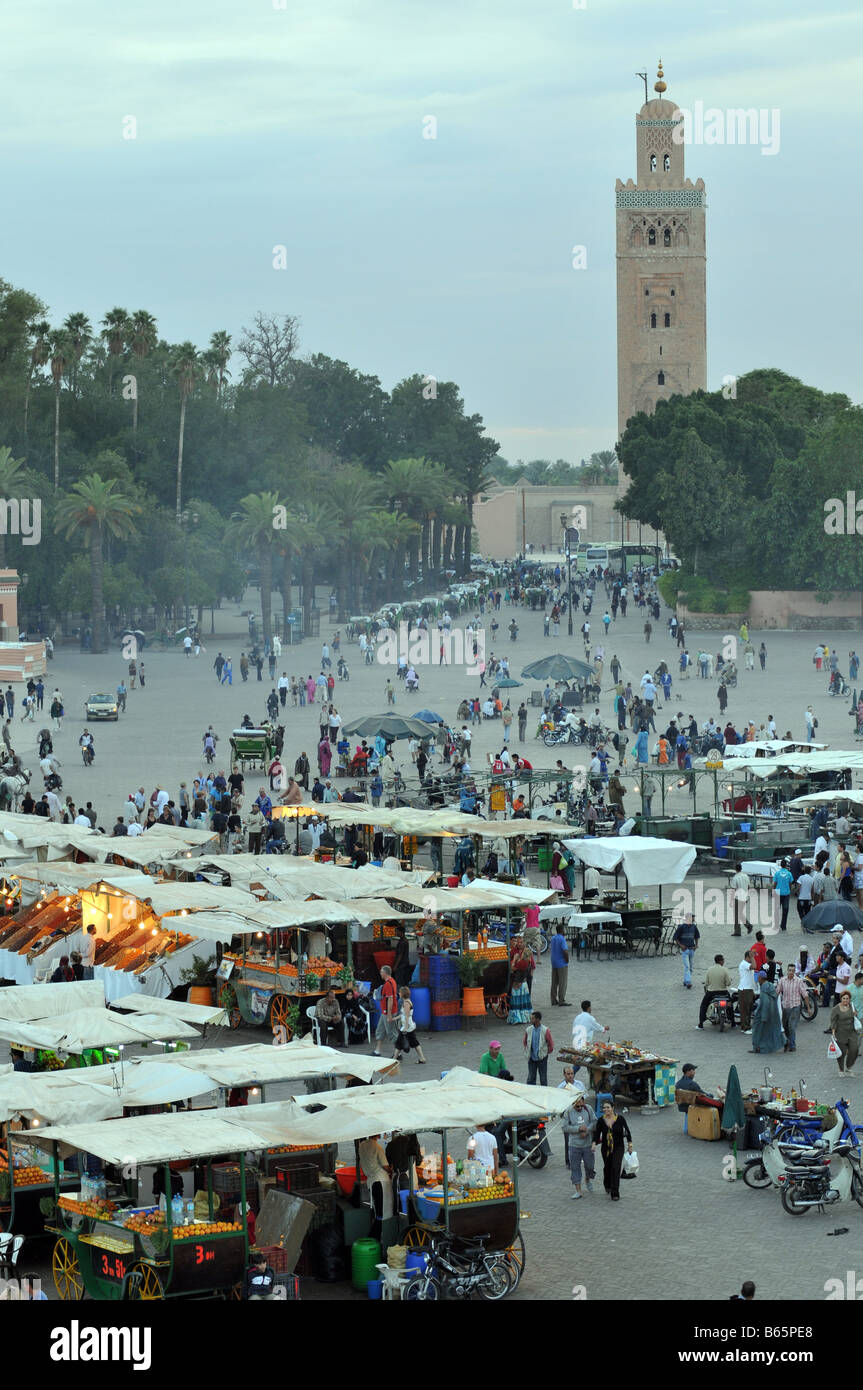 Food Stalls & Koutoubia Mosque, Djemma el-Fna Square, Marrakash, Morocco Stock Photo