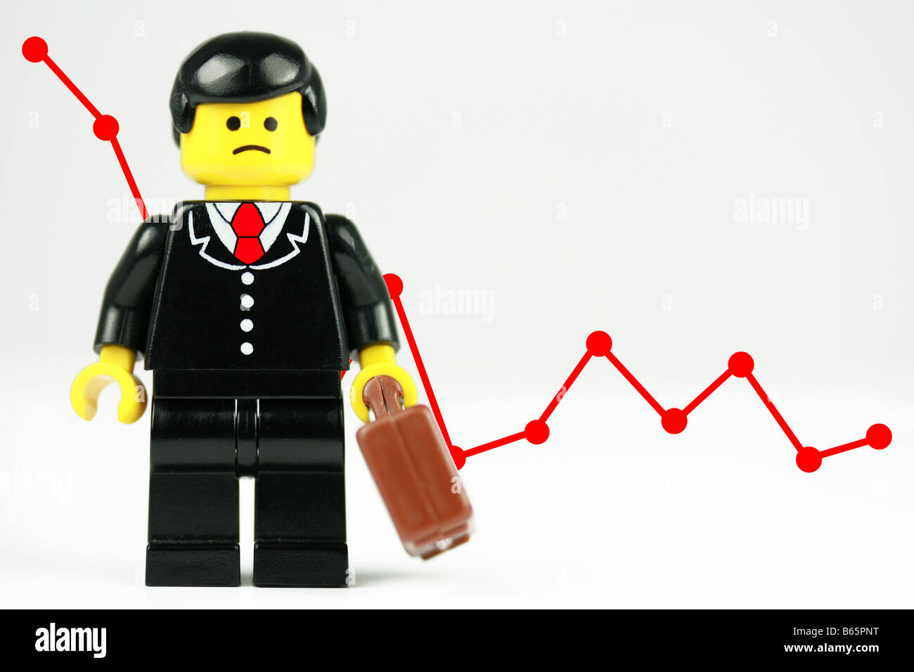 Unhappy Lego businessman - business concept Stock Photo