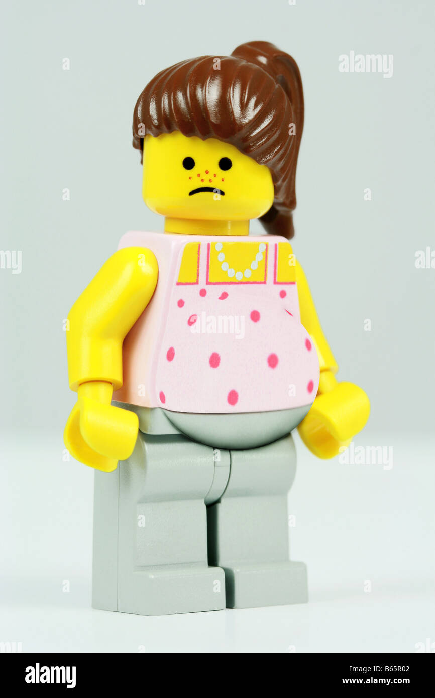 unhappy pregnant lego girl Stock Photo