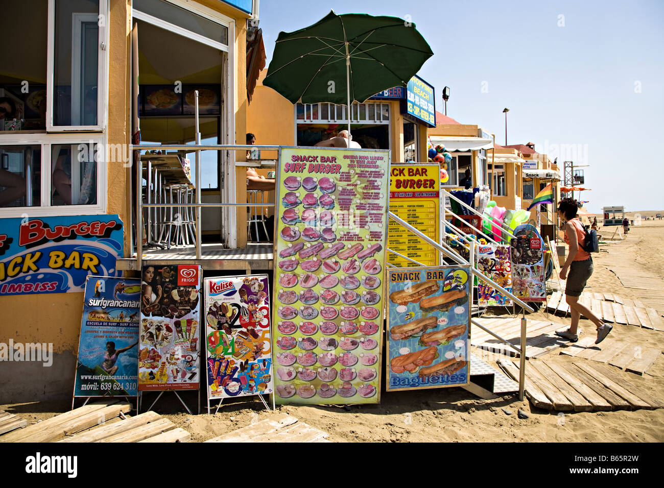 Signs on beach front snack bar Maspalomas Gran Canaria Spain Stock Photo