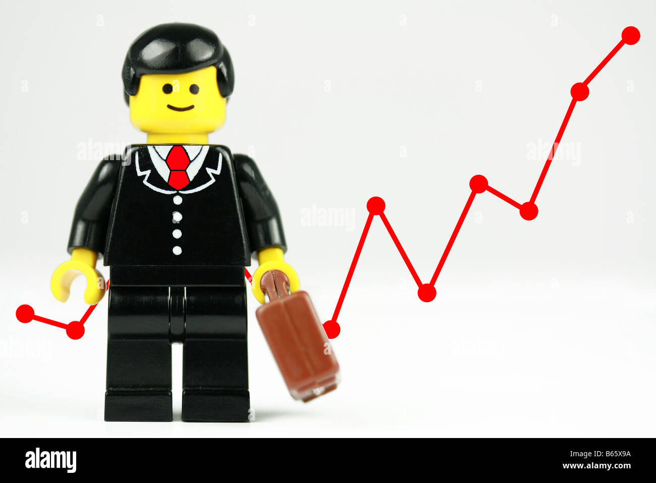 Happy Lego businessman - business success concept Stock Photo