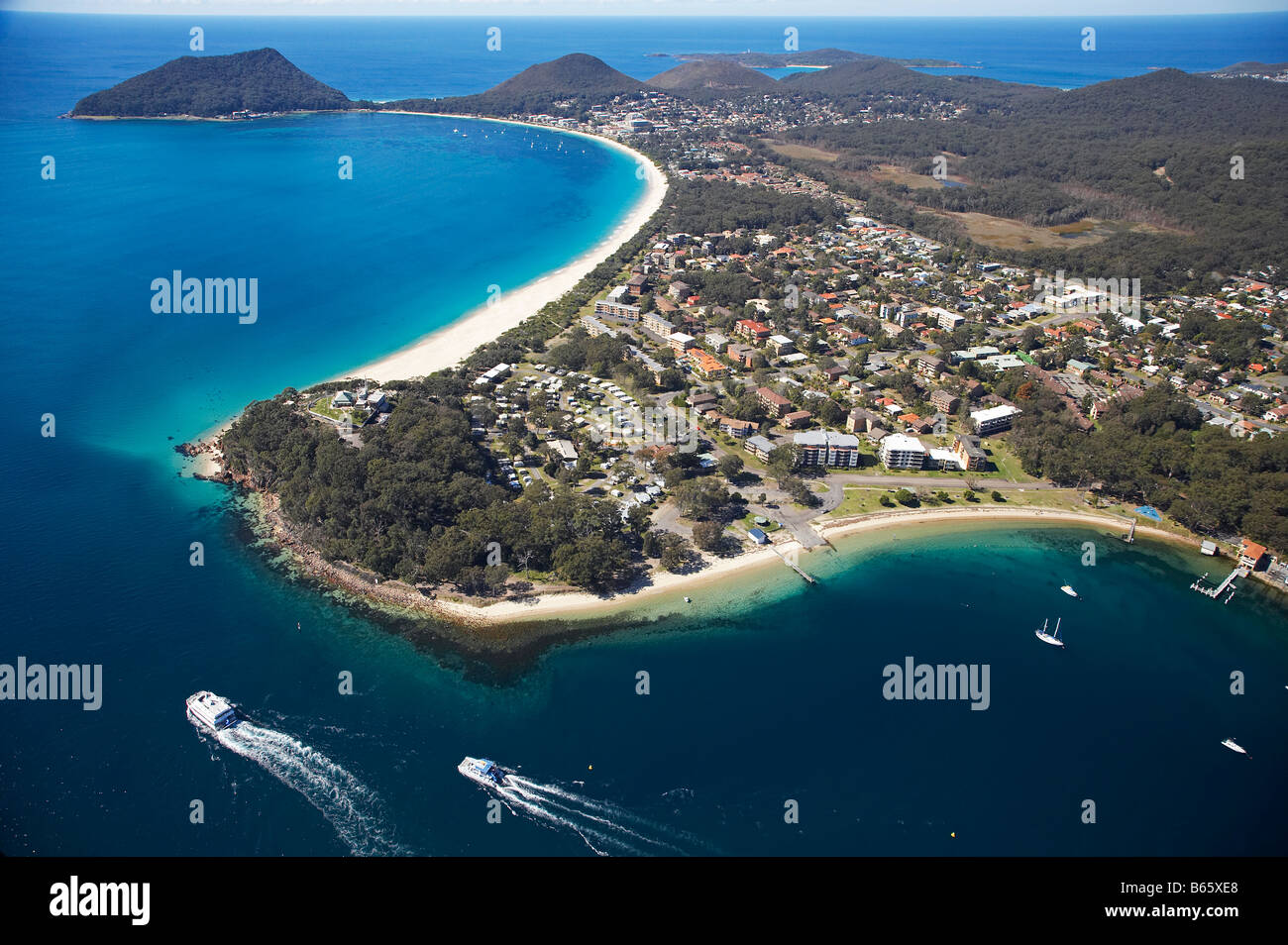 Nelson Head Nelson Bay closest Shoal Bay distance and Tomaree Head Port Stephens New South Wales Australia aerial Stock Photo