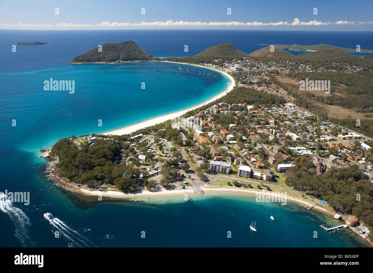 Nelson Head Nelson Bay closest Shoal Bay distance and Tomaree Head Port Stephens New South Wales Australia aerial Stock Photo