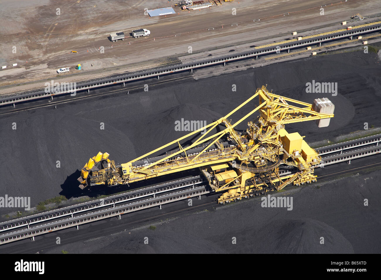 Giant Bucket Wheel Reclaimer Kooragang Coal Terminal Newcastle New South Wales Australia aerial Stock Photo