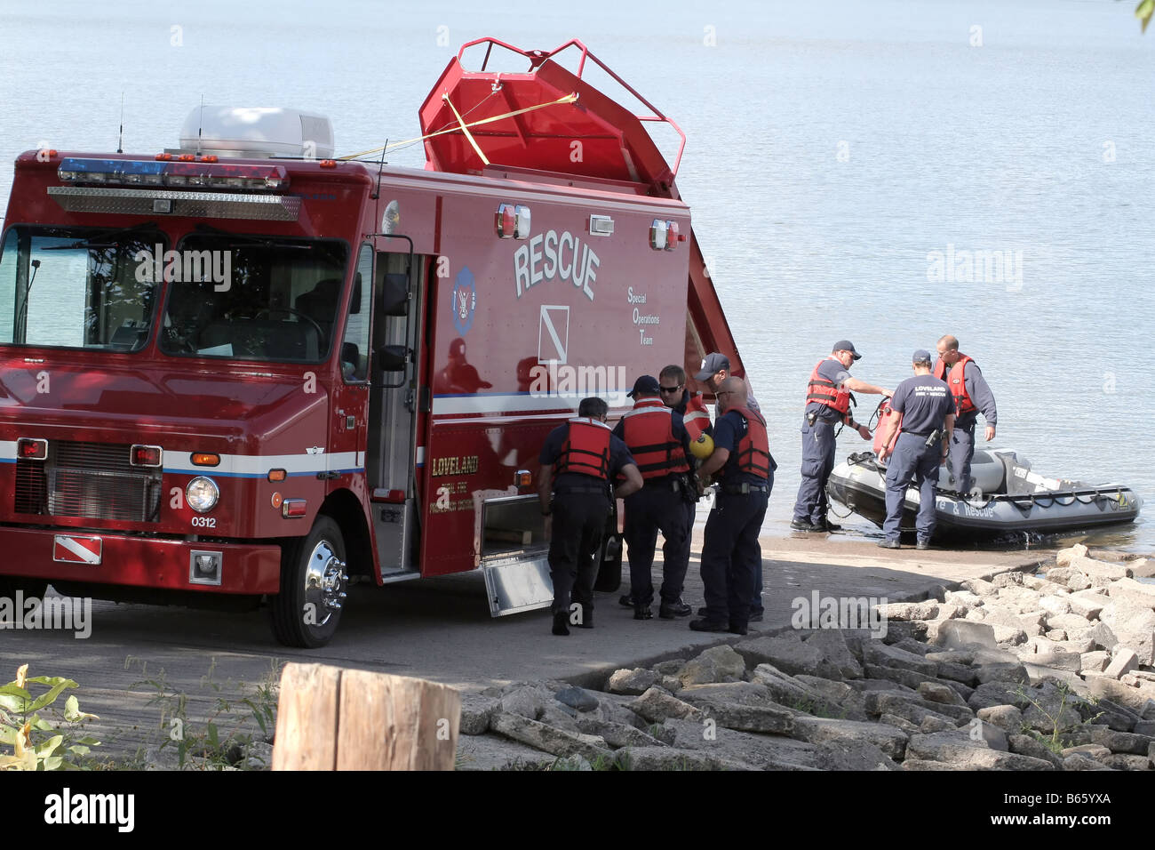 Fire search and rescue team at a lake rescue Stock Photo