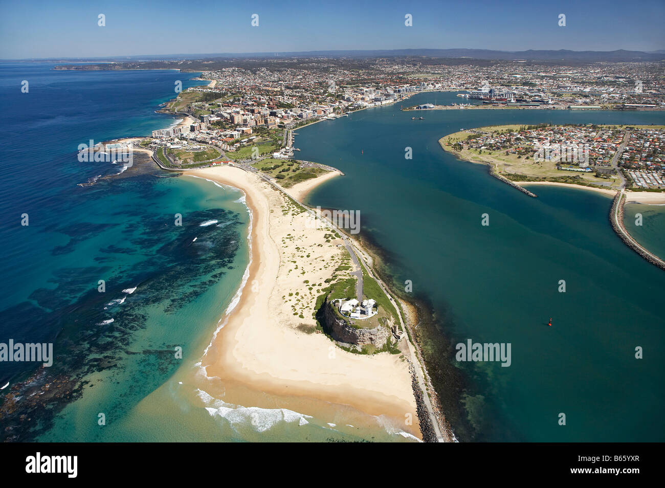 Nobbys Head and Entrance to Newcastle Harbour Newcastle New South Wales Australia aerial Stock Photo