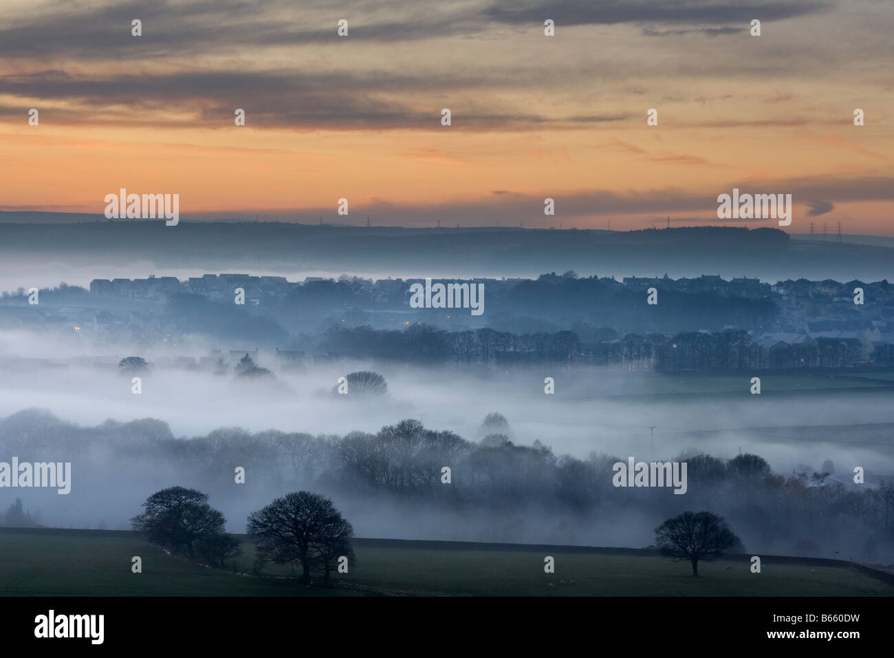 The view from Baildon Moor at sunset, as mist fills the Aire Valley at