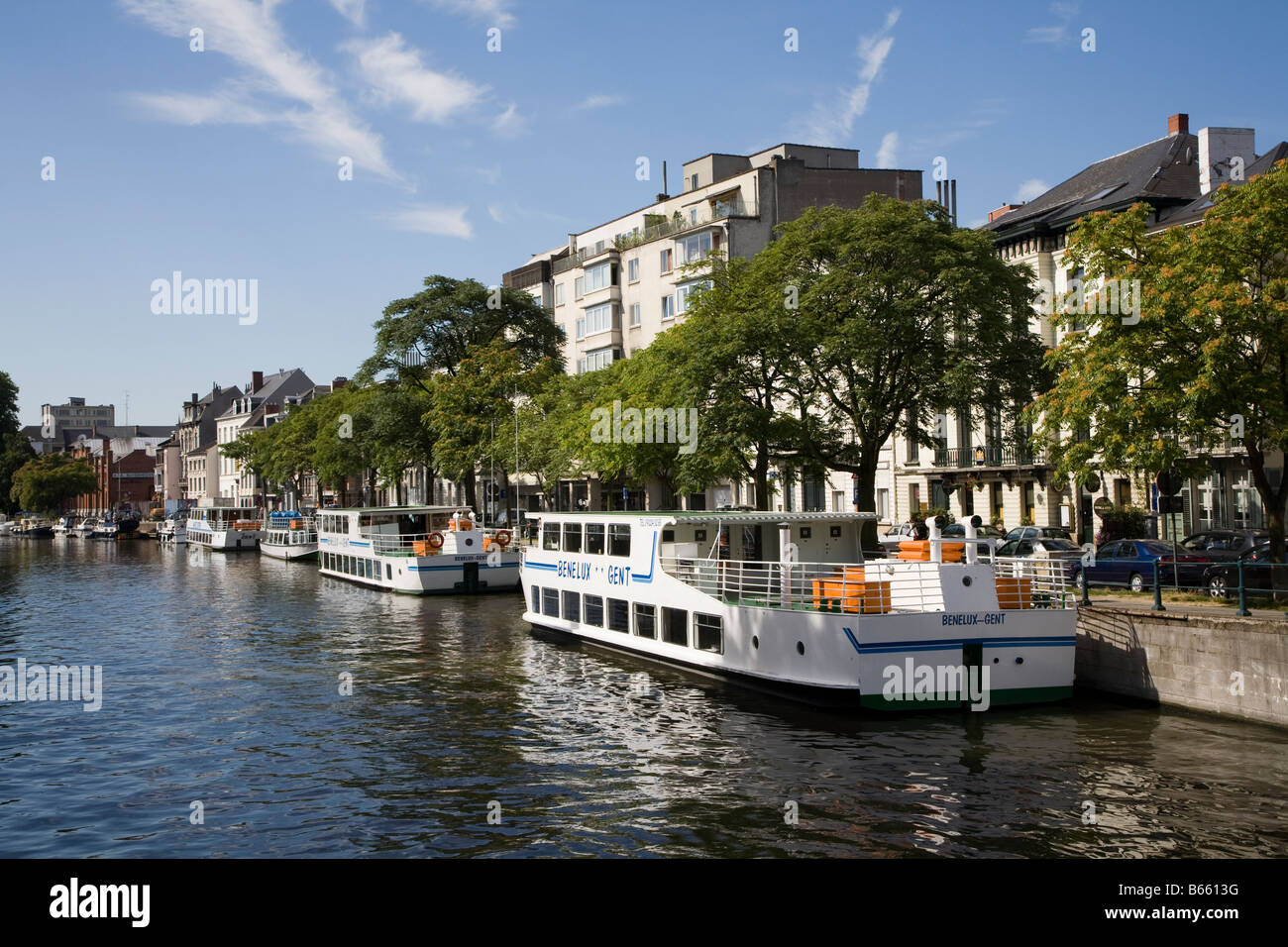 Boats moored on the Leie river Ghent Belgium Stock Photo