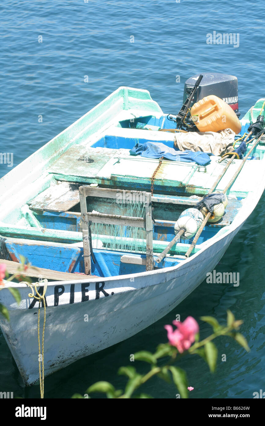 A old fiberglass mexican fishing boat tight up Stock Photo Alamy