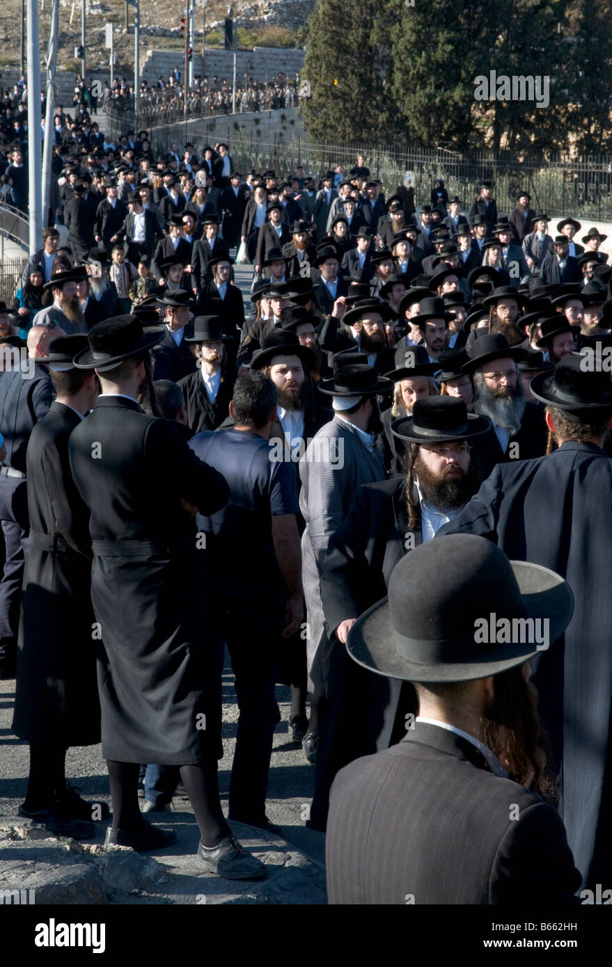 Israel Jerusalem Gethsemane Orthodox funeral crowd of orthodox jews walking down the road Stock Photo