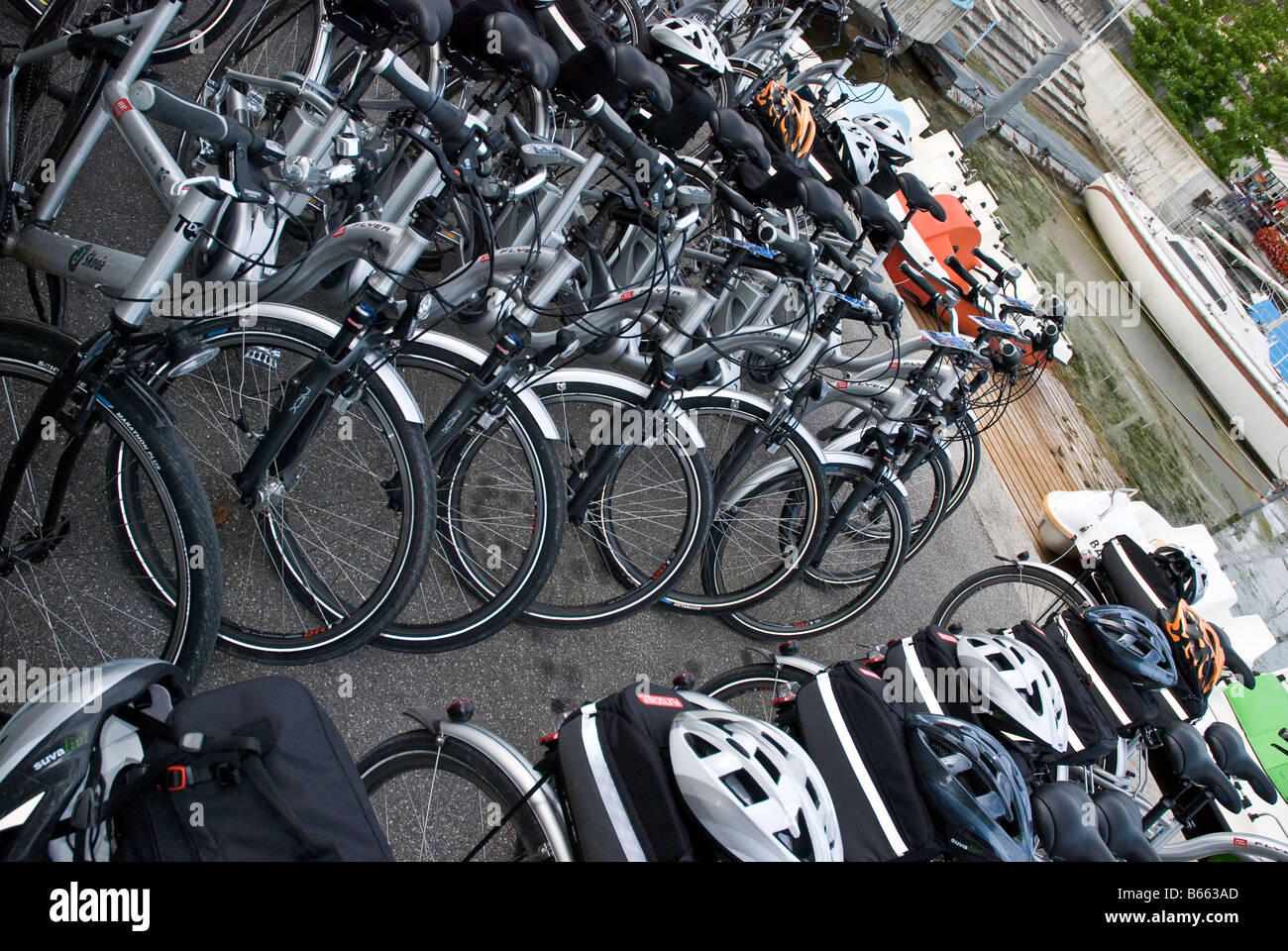 Rental electric bicycles in a row Stock Photo Alamy