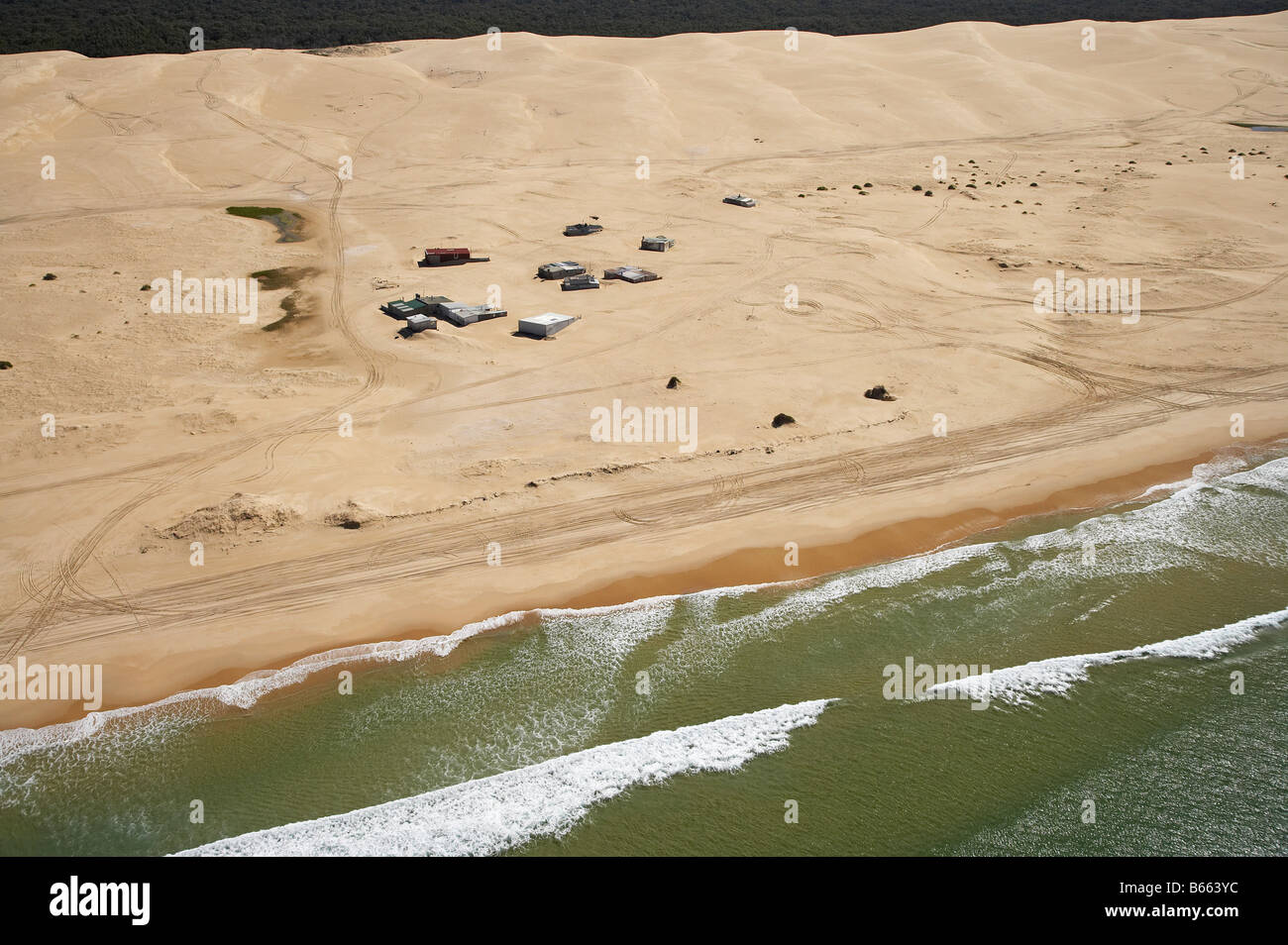 Tin City fishing huts Stockton Beach Newcastle New South Wales Australia aerial Stock Photo