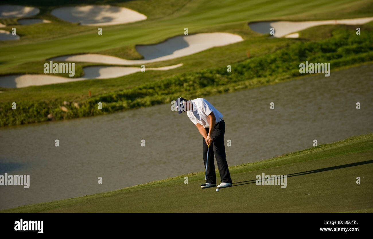 A golfer during the final round of the 2008 Omega World Cup of Golf at the Mission Hills Golf Club in Shenzhen Stock Photo