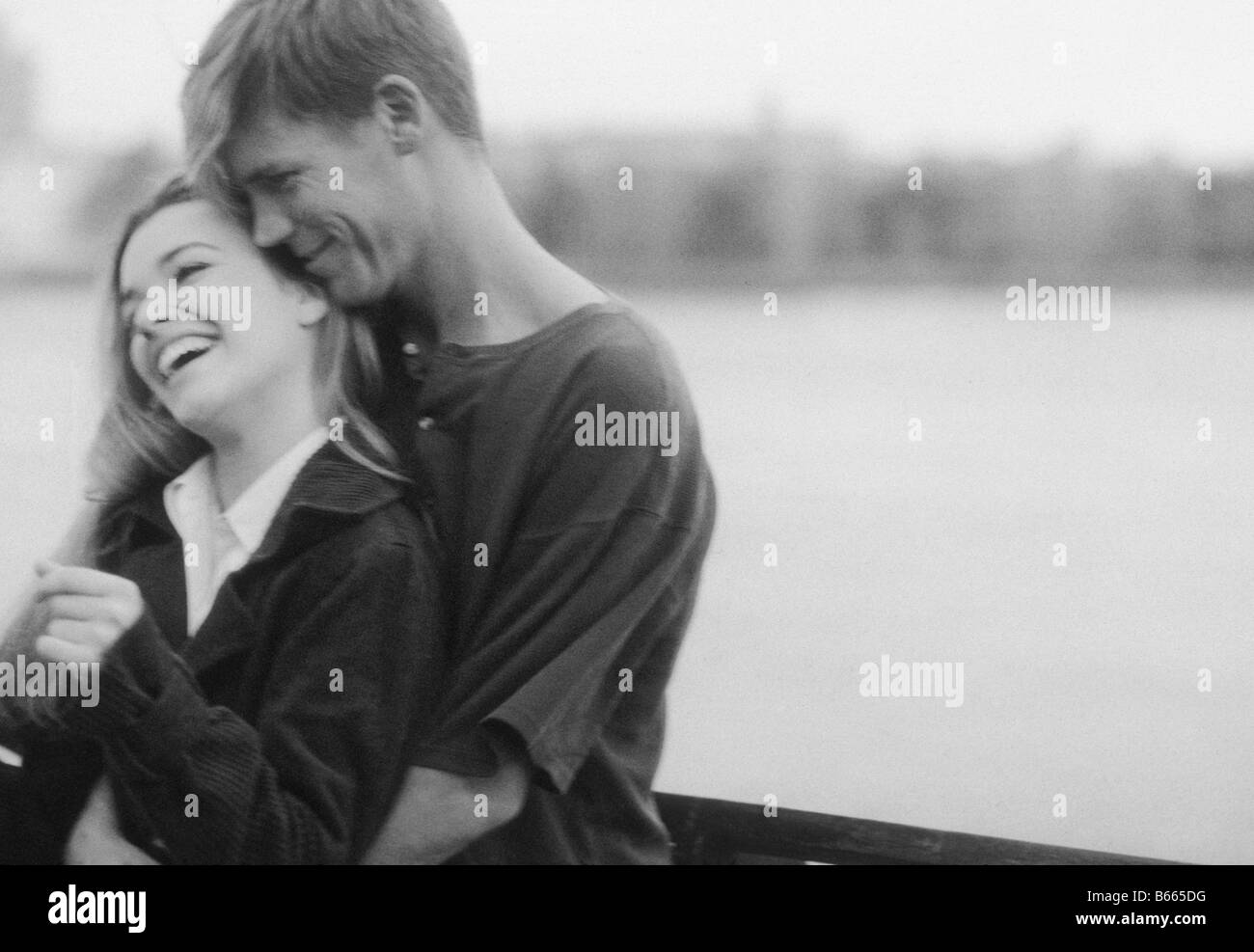 Cropped view two young Black and White Stock Photos & Images - Alamy