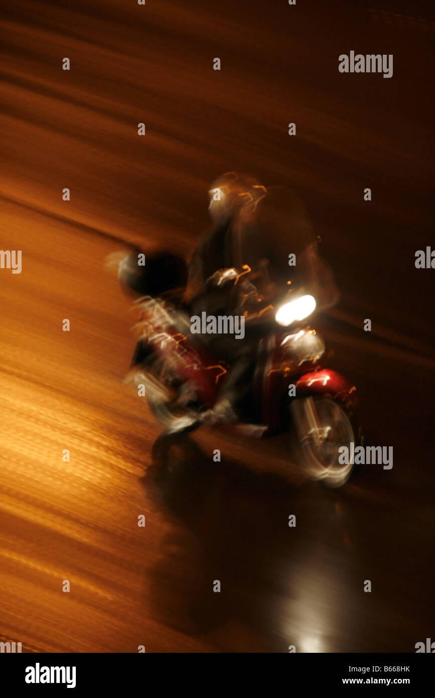 Moped rider night hi-res stock photography and images - Alamy