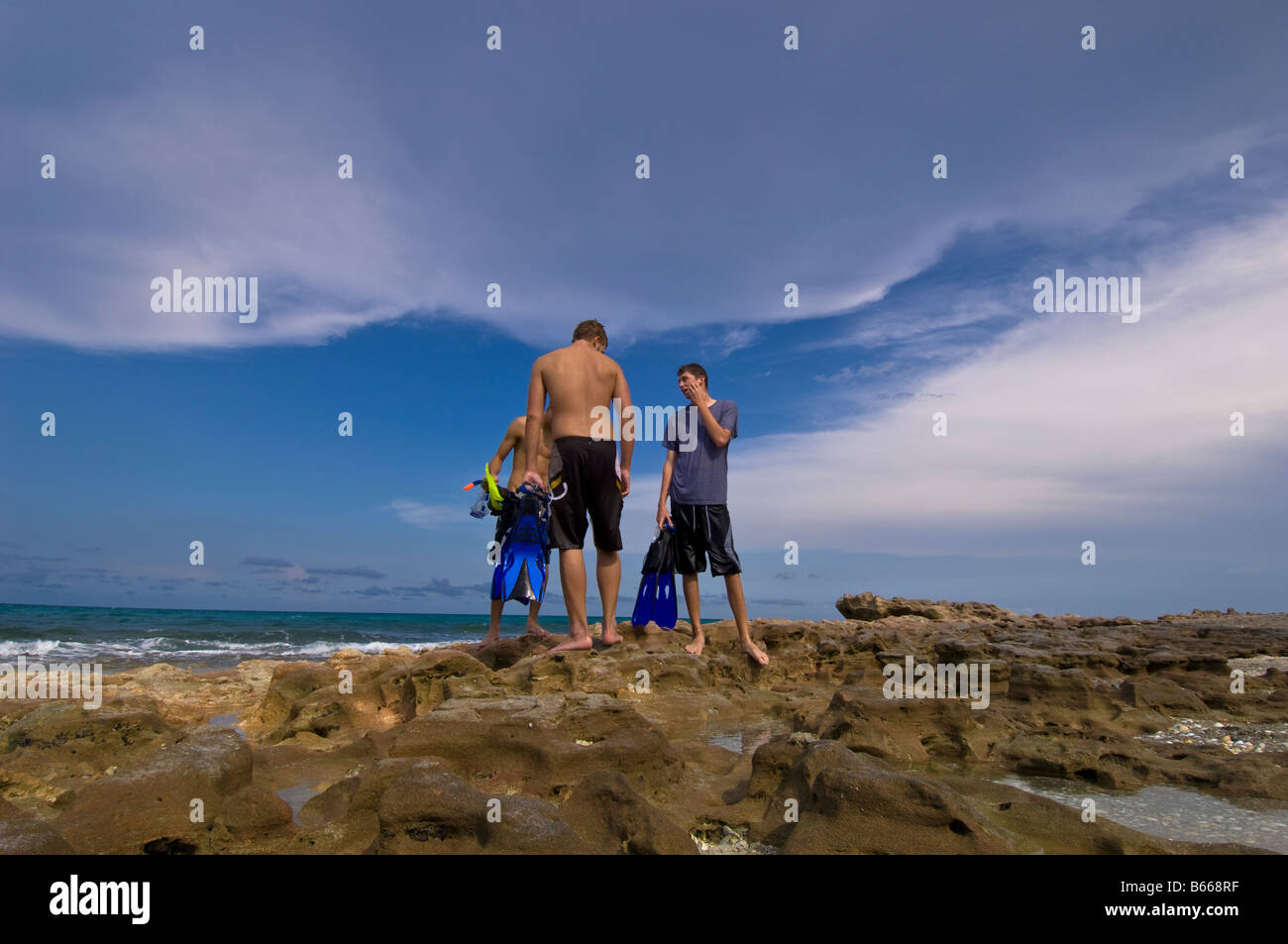 Boys snorkeling in Coral Cove Park Jupiter Island Gold Coast Florida United States of America Stock Photo