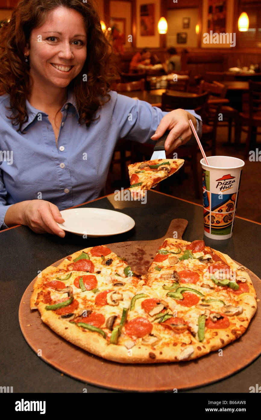 Pizza slice at Pizza Hut. Stock Photo