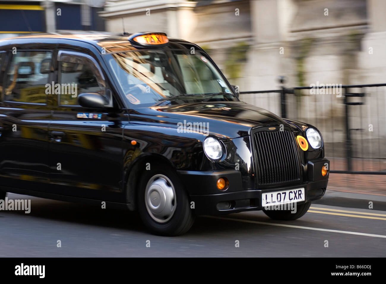 A taxi goes by in Croydon, London, England Stock Photo Alamy