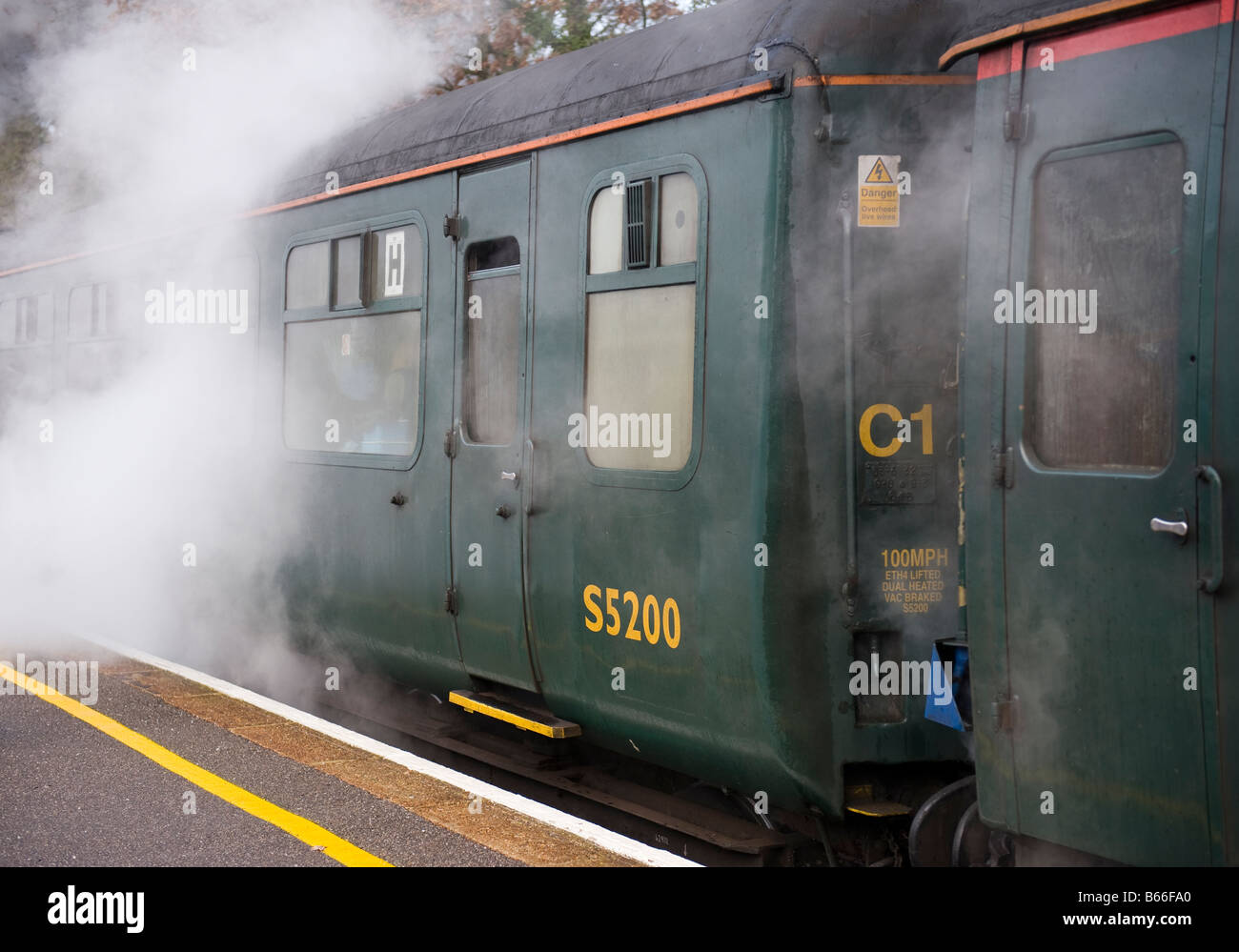 Slam Door Railway Coaches at Ascot Station attached to an Steam Excursion Train Stock Photo