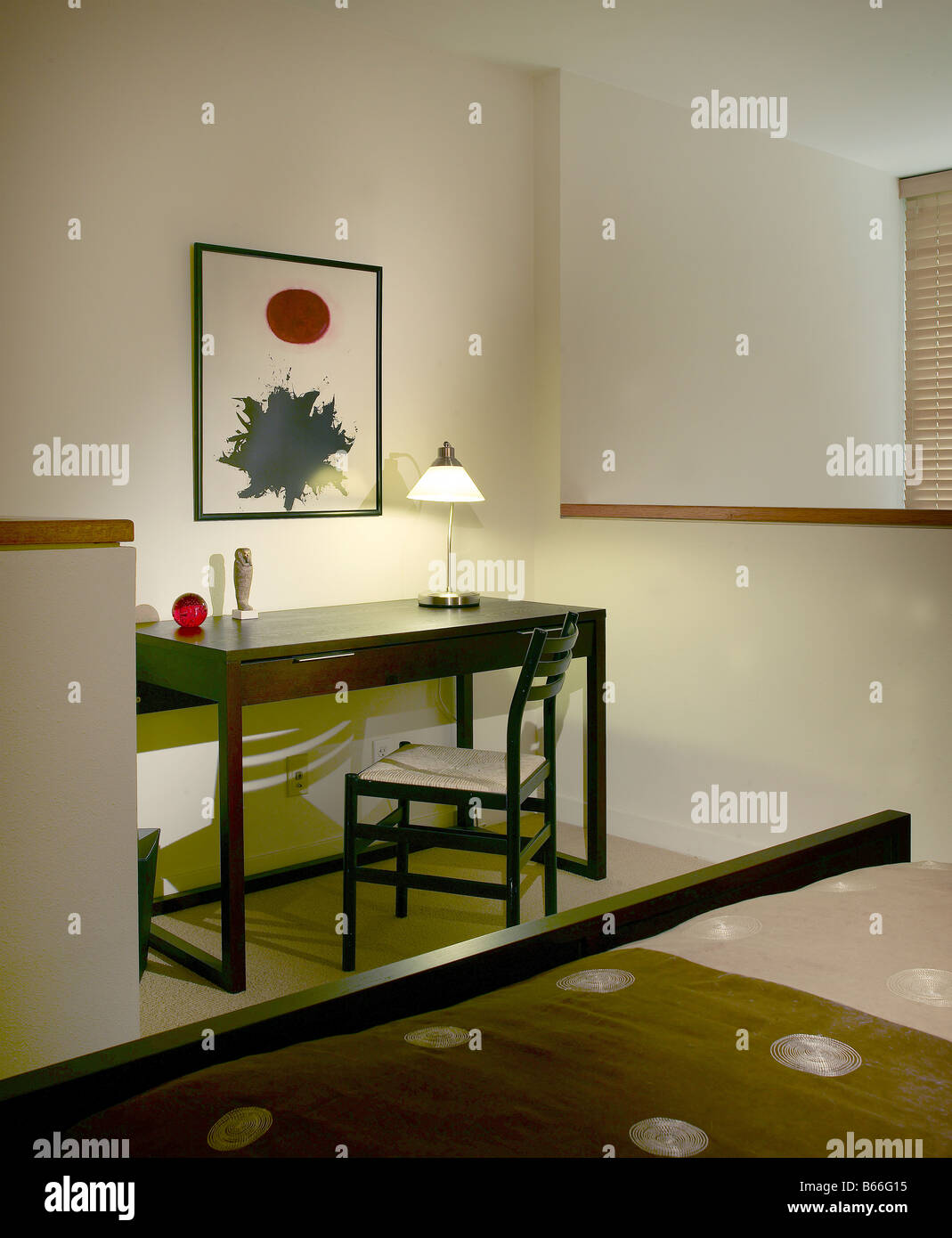 Contemporary Bedroom with dark wood desk Stock Photo - Alamy