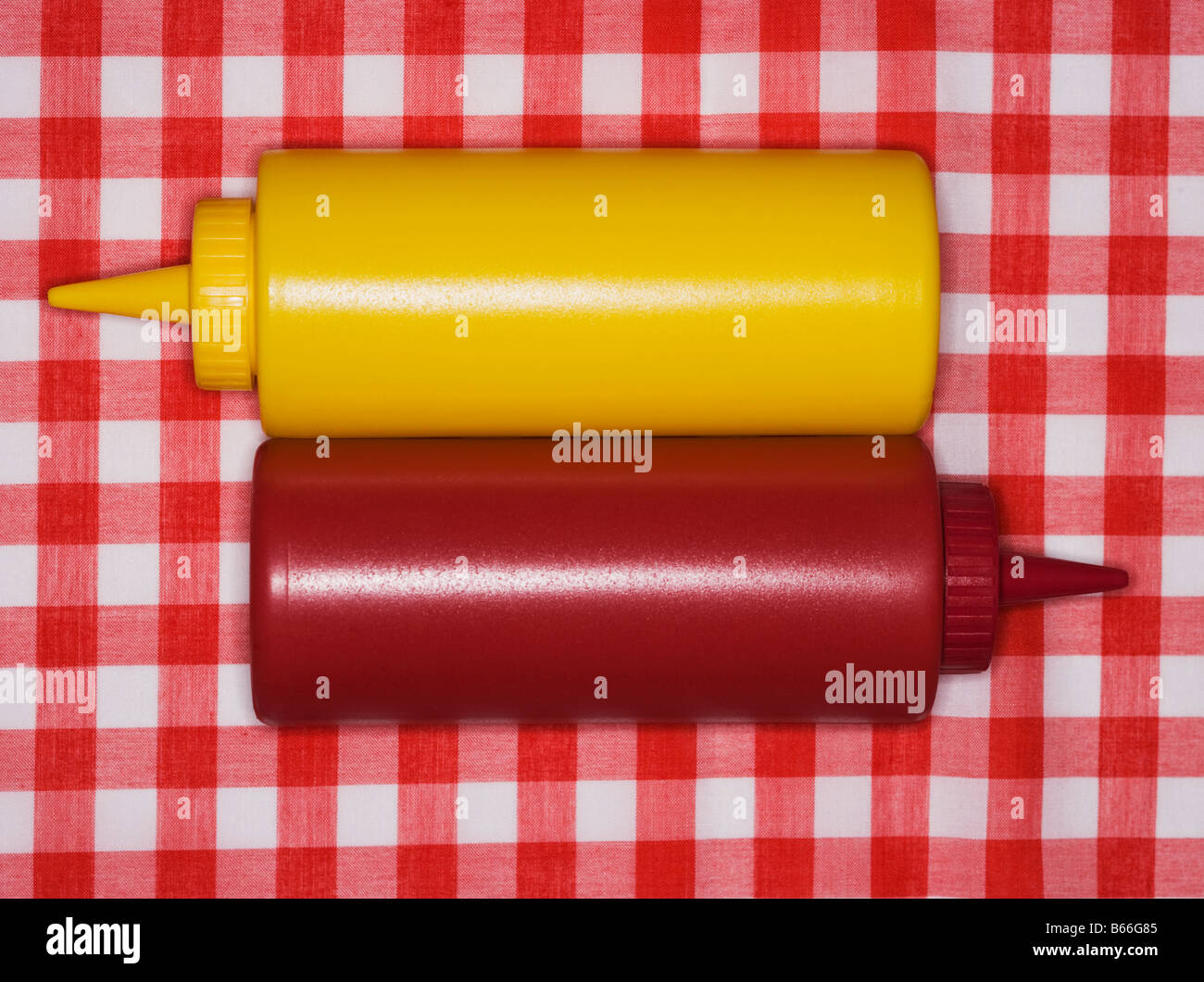 Yellow and red plastic bottles for spice or sauce Stock Photo