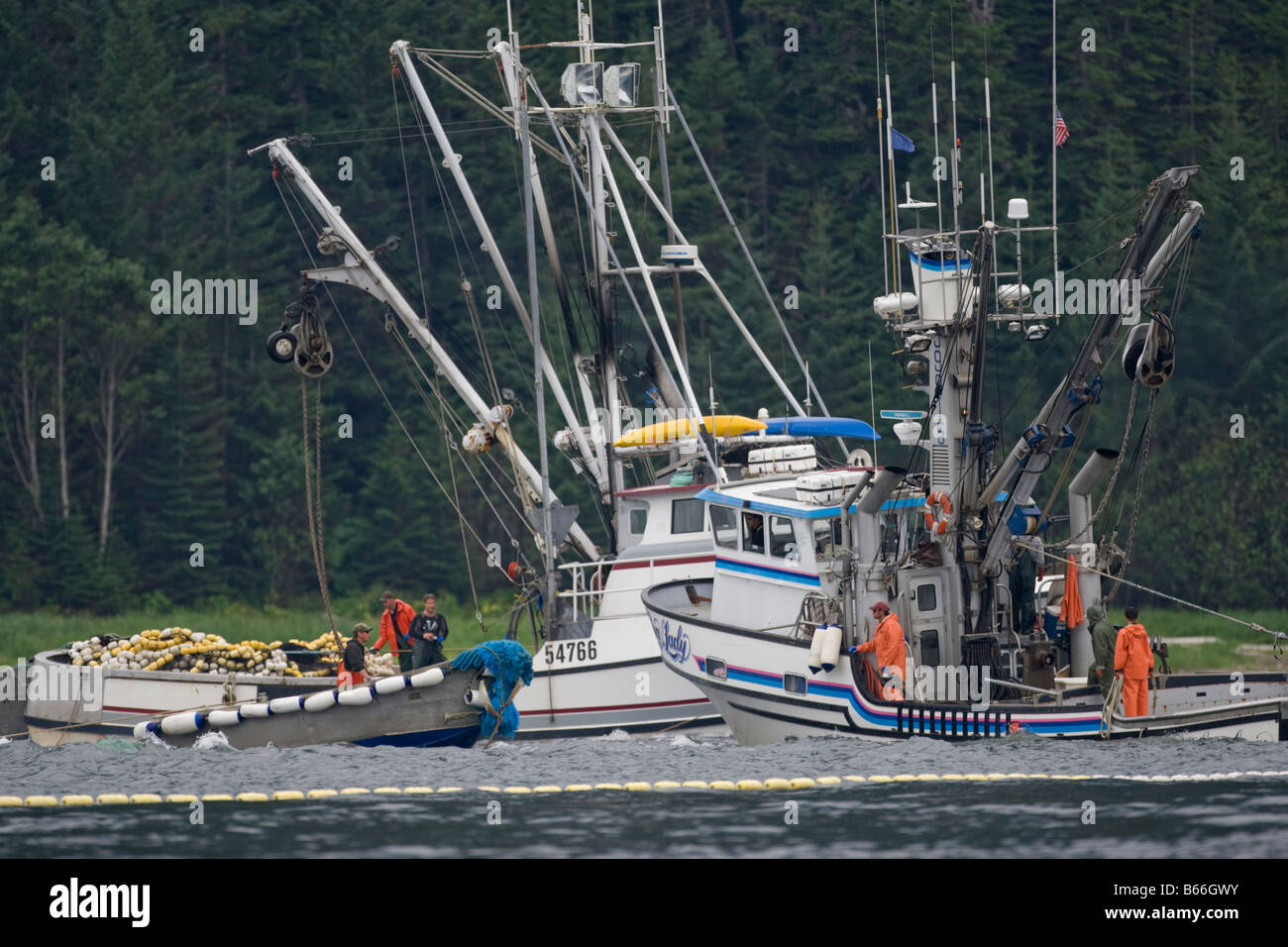 USA Alaska Salmon fishing boats gathers nets near feeding pod of Humpback Whales in Chatham Strait Stock Photo