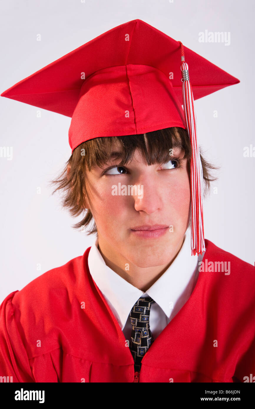 Male graduate in red gown hi-res stock photography and images - Alamy