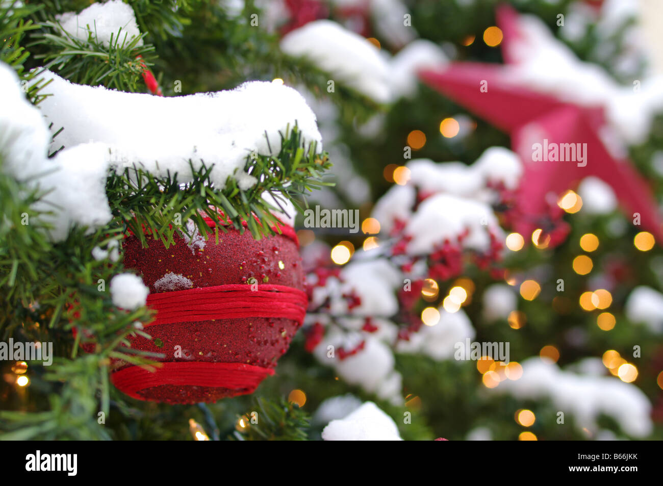 Christmas decoration covered by snow Stock Photo