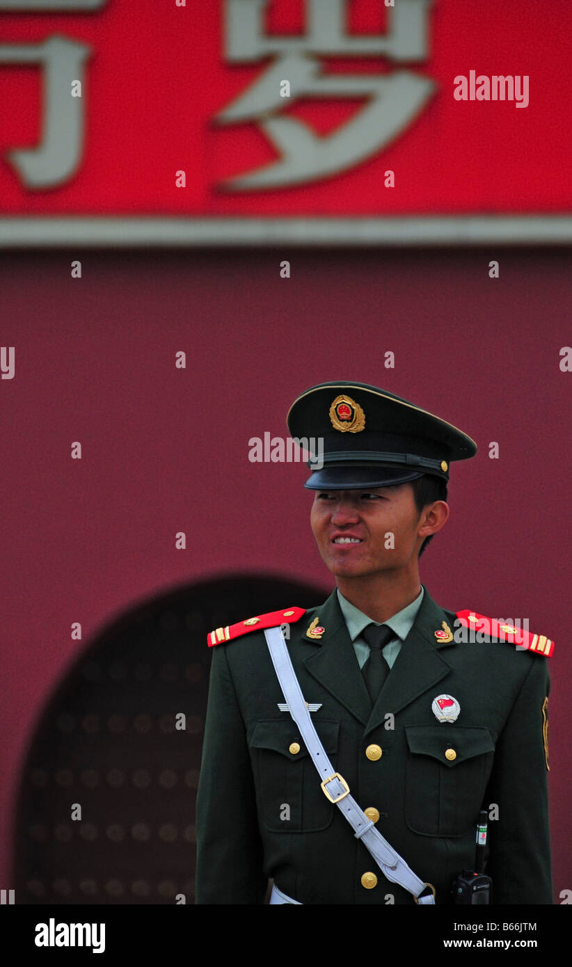 Chinese soldier in front of the Heavenly peace gate ( entrance of the forbidden city)  and next to Tienanmen square Beijing Stock Photo