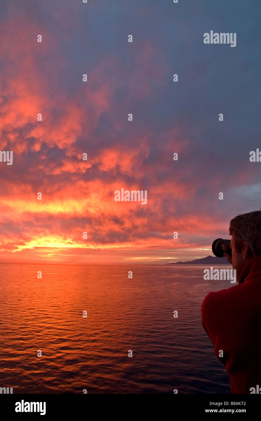 Photographer shooting sunset at Sea of Cortez Stock Photo
