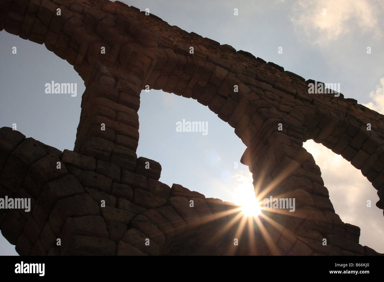 Roman aqueduct in Segovia, Spain with morning sun. Stock Photo