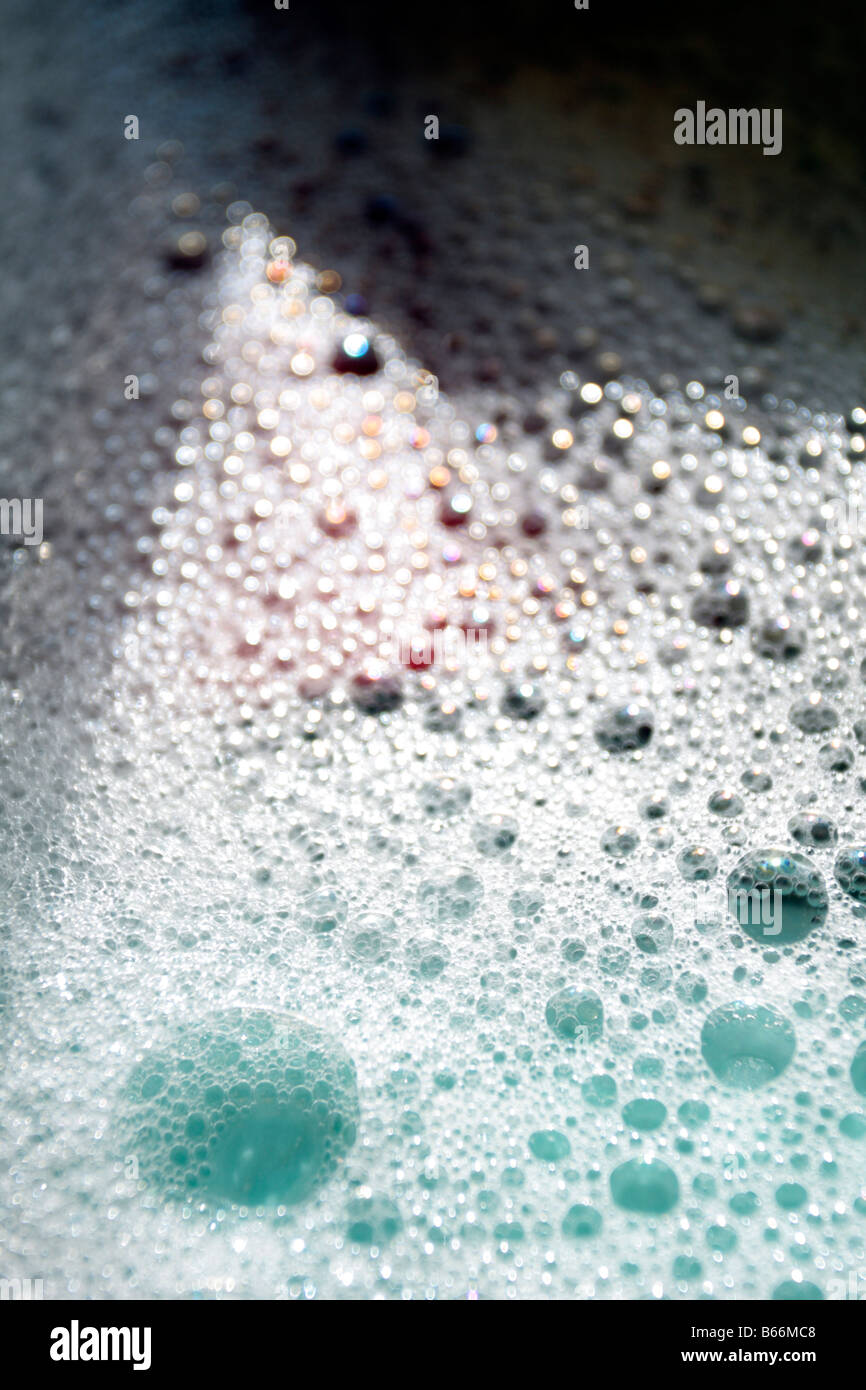 Soap bubbles in dishwater Stock Photo Alamy