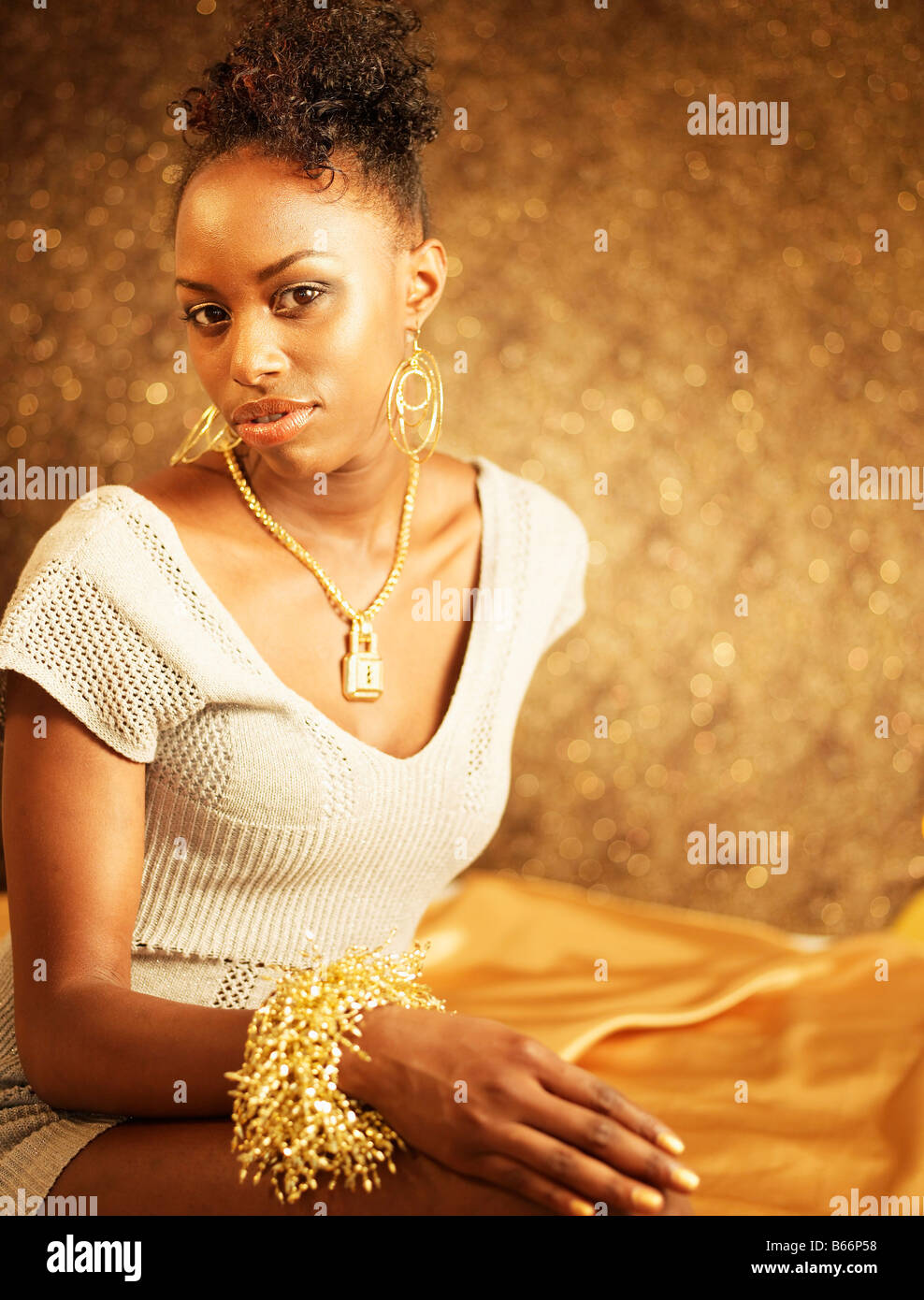 Young Woman Wearing Gold Jewelry Stock Photo Alamy