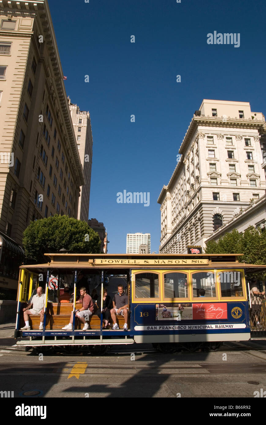 streetcar in san francisco between skyscraper,cable car,usa Stock Photo