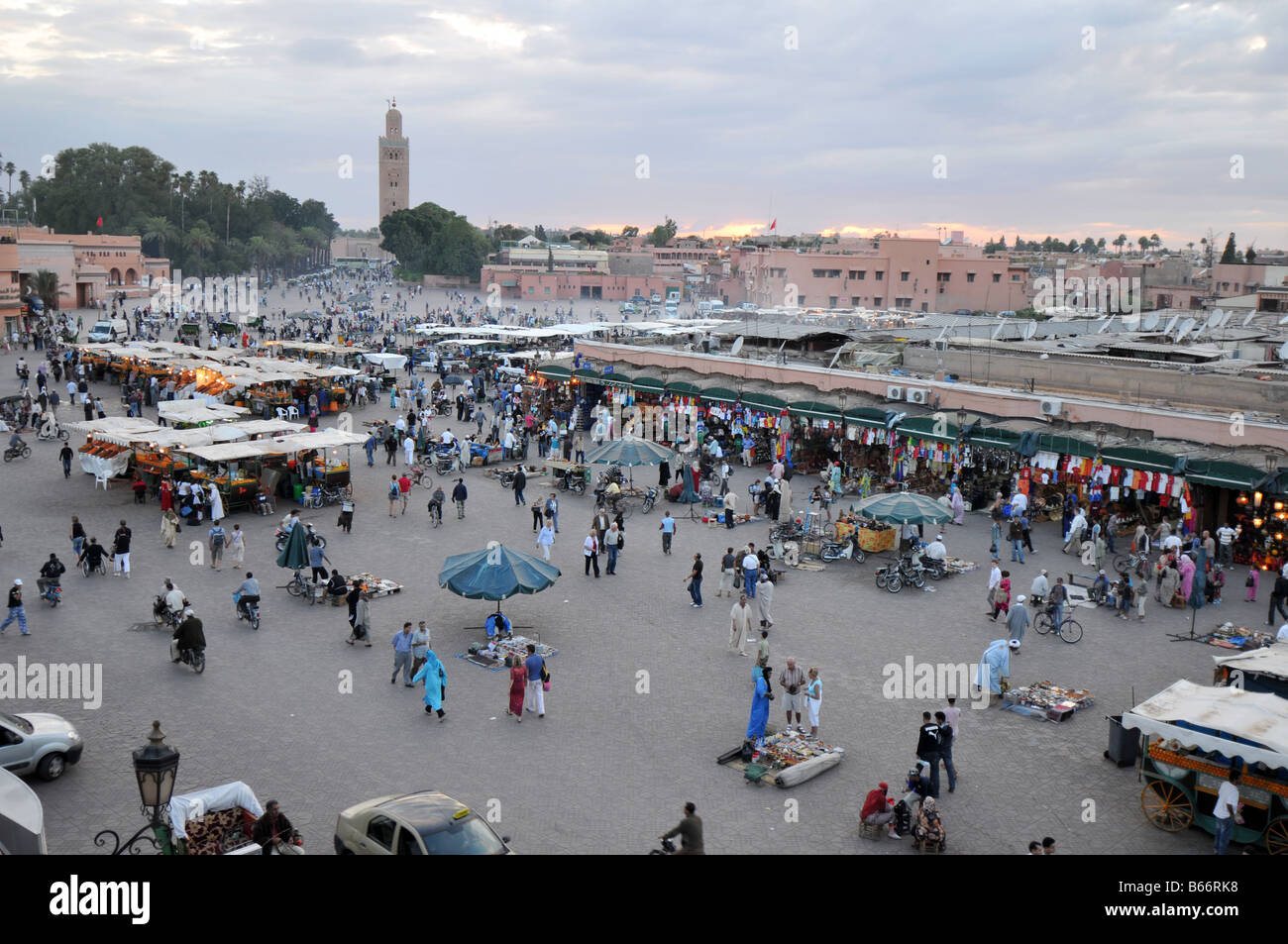 Food Stalls & Koutoubia Mosque, Djemma el-Fna Square, Marrakash, Morocco Stock Photo