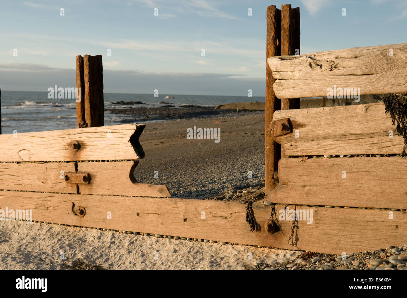 heavily eroded and storm damaged sea defences on Aberystwyth beach Wales UK in need of repair or replacement Stock Photo