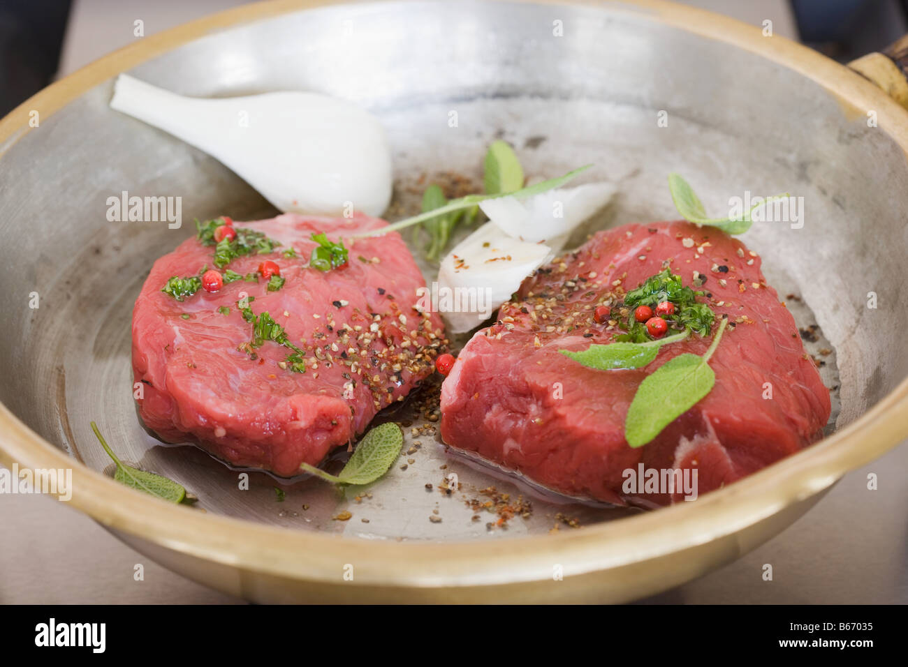 Steak in a marinade Stock Photo