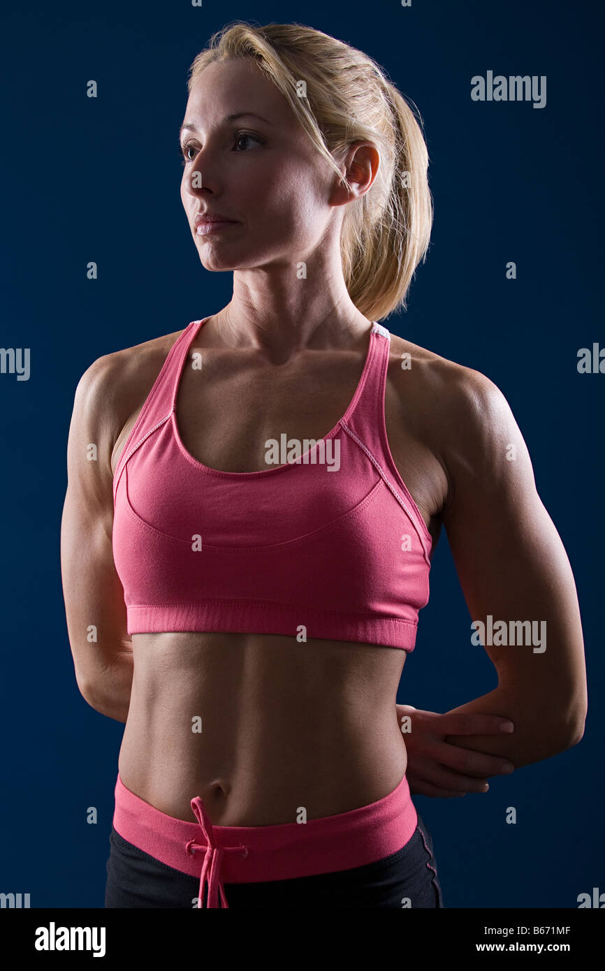 Portrait of a muscular woman Stock Photo - Alamy