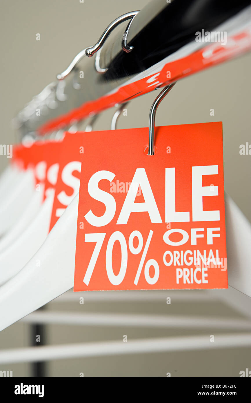 Sale labels on clothes hangers Stock Photo Alamy