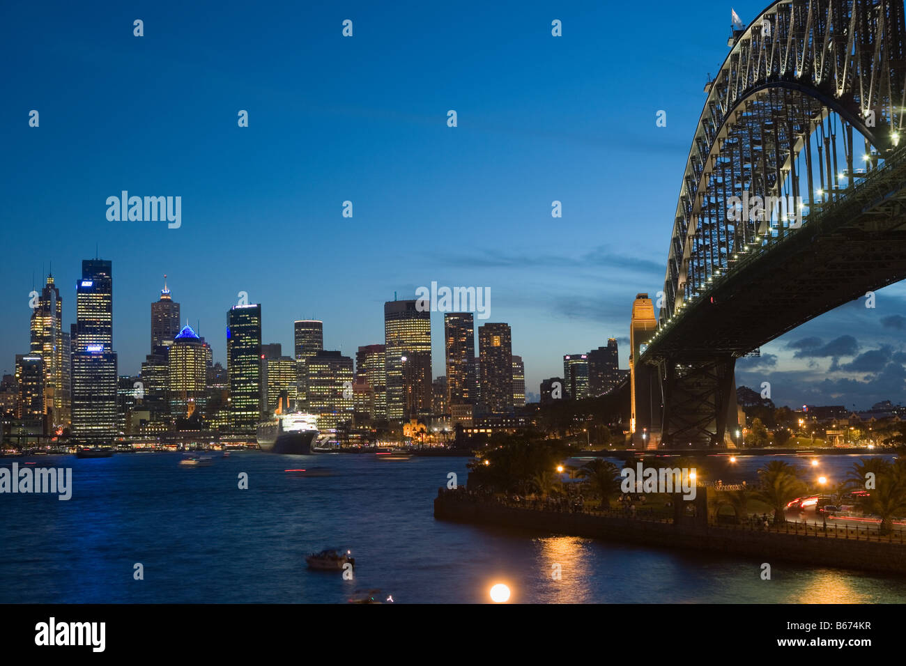 Sydney harbour bridge and skyline at nigh Stock Photo